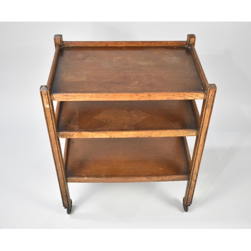 36 - An Early 20th Century Oak Three Tier Trolley on Caster Supports, 63x40x27cms High