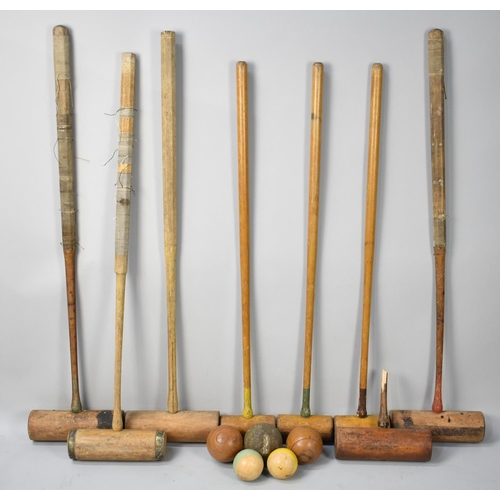 391 - A Collection of Various Vintage Croquet Mallets and Balls, Condition Issues