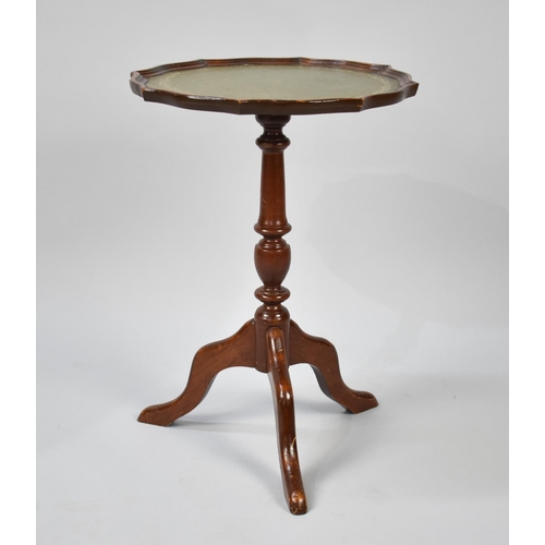 409 - A Mid 20th Century Mahogany Piecrust Wine Table with Leather Top