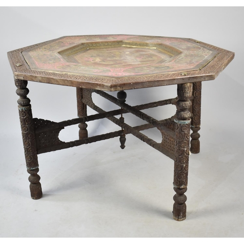 422 - A Large Indian Octagonal Carved Wooden and Brass Occasional Table, the Inset Brass Tray Decorated in... 