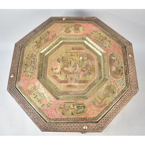 422 - A Large Indian Octagonal Carved Wooden and Brass Occasional Table, the Inset Brass Tray Decorated in... 