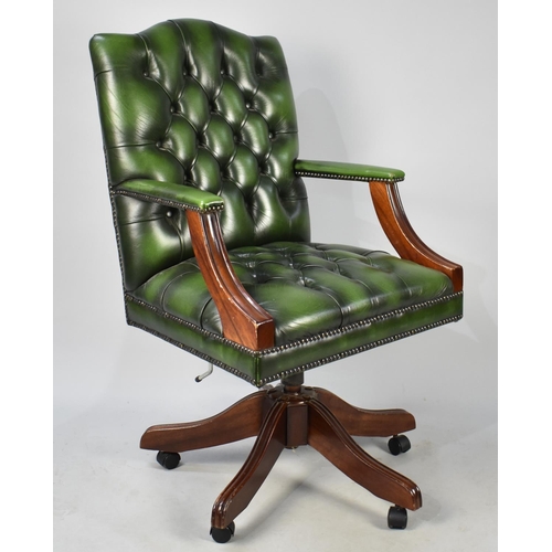 431 - A 20th Century Green Leather Button Back Captains Office Chair on Castor Supports