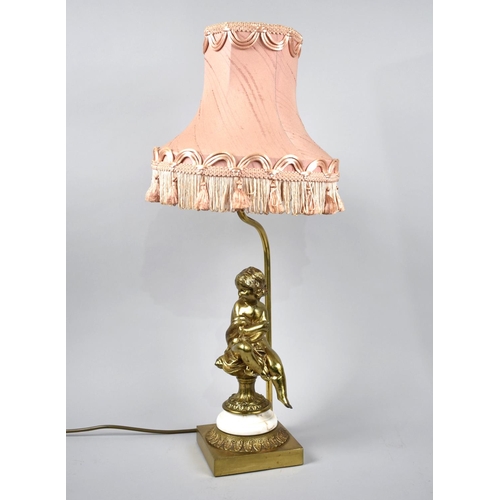 72 - A Gilt Figural Lamp Modelled with Seated Maiden, Completed with Shade, 60cms High