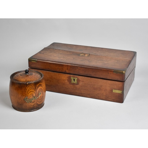 8 - An Early/Mid 20th Century Oak Tobacco Pot of Barrel Form together with a 19th Century Mahogany Brass... 