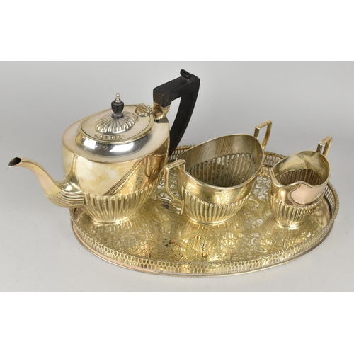 80 - A Silver Plated Three Piece Tea Service to comprise Teapot, Sugar Bowl and Jug together with an Oval... 