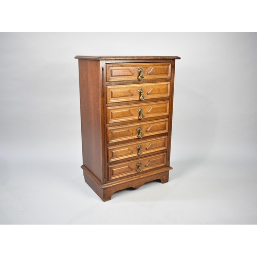 117 - A Mid/Late 20th Century Continental Oak Chest of Six Drawers with Brass Drop Handles, 65cms Wide