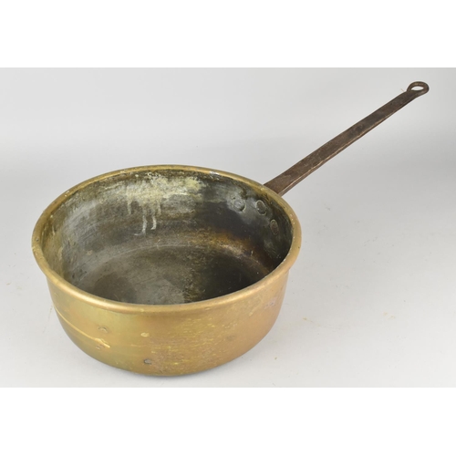 120 - A Late 19th/Early 20th Century Large Brass Saucepan with Iron Handle, 30cms Diameter and 12cms High