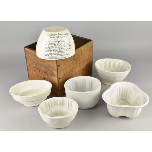 161 - A Vintage Wooden Box for Jeyes Fluid together with a Collection of Six White Glazed Jelly Moulds to ... 