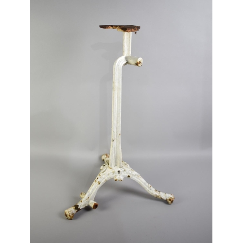 163 - A Late 19th Century White Painted Cast Iron Tripod Stand, 67.5cms High