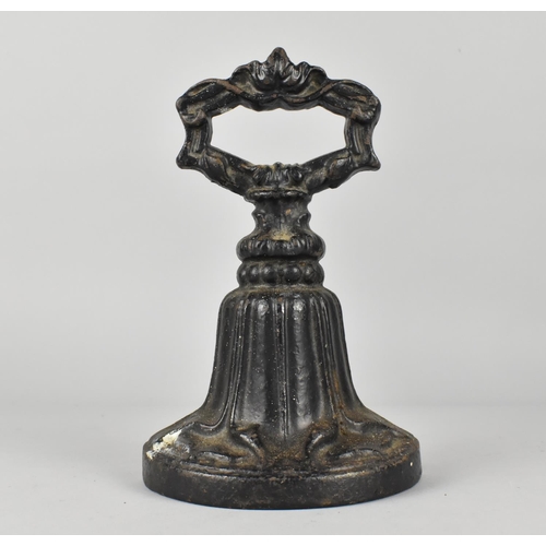 19 - A Small 19th Century Cast Iron Doorstop, 19.5cms High