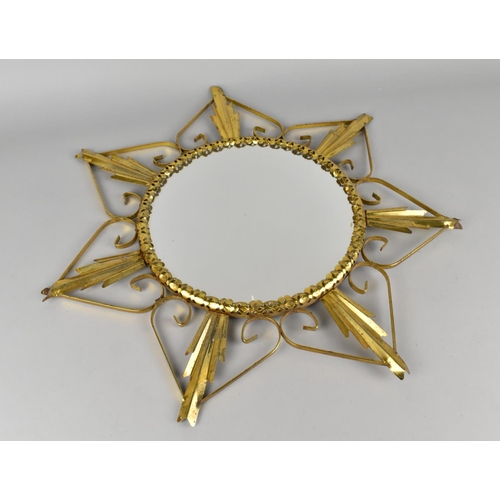 191 - A Mid 20th Century Gilt Brass Framed Starburst Wall Mirror, Glass 26cms Diameter