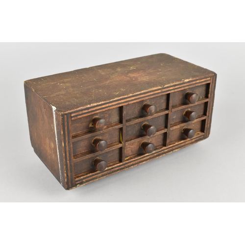 2 - A Small Table Top Engineers or Collectors Chest of Nine Small Drawers with Wooden Handles, 19.5cms W... 