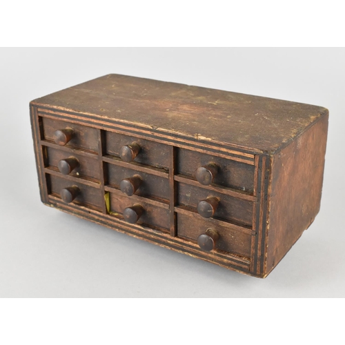 2 - A Small Table Top Engineers or Collectors Chest of Nine Small Drawers with Wooden Handles, 19.5cms W... 