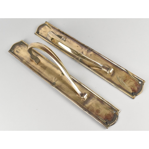 20 - A Pair of Late 19th Century Polished Bronze Door Handles, 38cms by 5.5cms