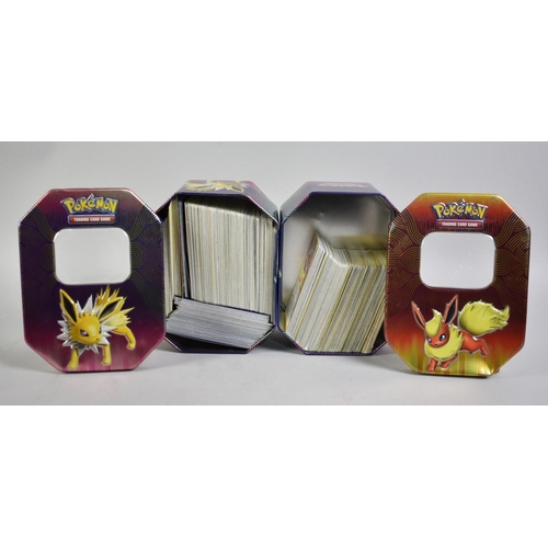 219 - Two Pokemon Tins Both Containing Quantity Pokemon Cards