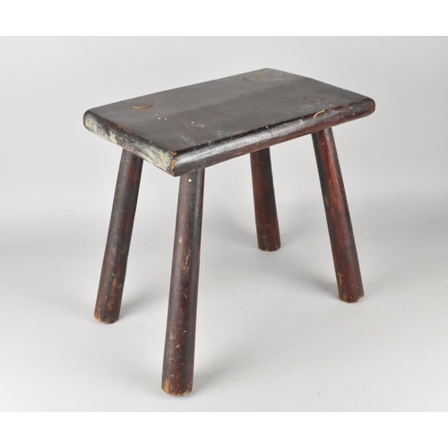 239 - A Small Rectangular Four Legged Stool, 32x22cms