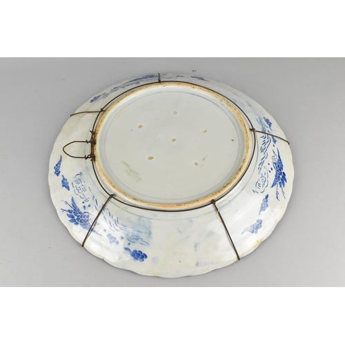 250 - A Japanese Porcelain Imari Charger with Scalloped Edge Decorated with Green Dragons and Bordered by ... 