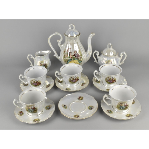 264 - A Pearlescent Tea Set to Comprise Teapot, Sugar Bowl, Milk Jug, Five Cups and Six Saucers