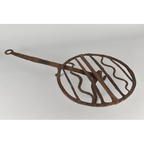 303 - A 19th Century Rotating Iron Trivet, 59cm Long (Some Condition Issues)