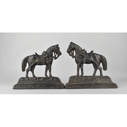 37 - A Pair of Late 19th Century Cast Iron Door Stops in the Form of War Horses, Stepped Plinth Base, 20.... 