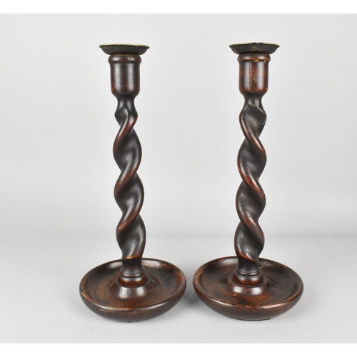 48 - A Pair of Late Victorian/Edwardian Barley Twist Oak Candlesticks, 30.5cms High