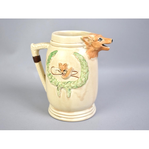 50 - A KSP Pottery Relief Fox Mask Jug with Sporting Decoration, 15.5cms High