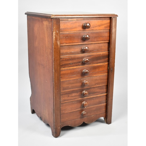 6 - A Late 19th Century Mahogany Wellington Type Chest of Nine Drawers with Hinged Locking Plate, 41cms ... 