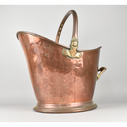 62 - A Late 19th Century Copper Helmet Shaped Coal Scuttle Bucket, 44cms High