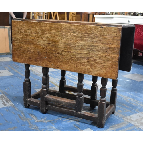 81 - A 19th Century Oak Gate Leg Drop Leaf Rectangular Table, 82cms Long