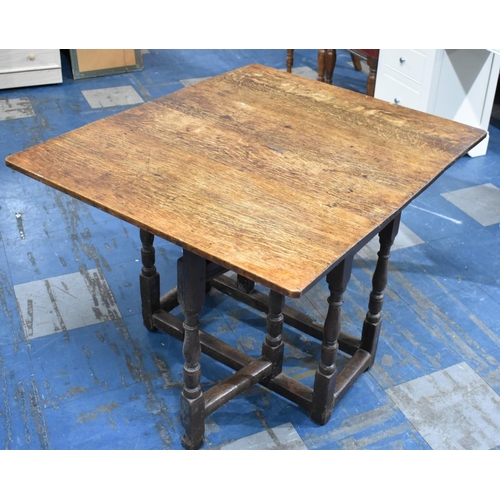 81 - A 19th Century Oak Gate Leg Drop Leaf Rectangular Table, 82cms Long