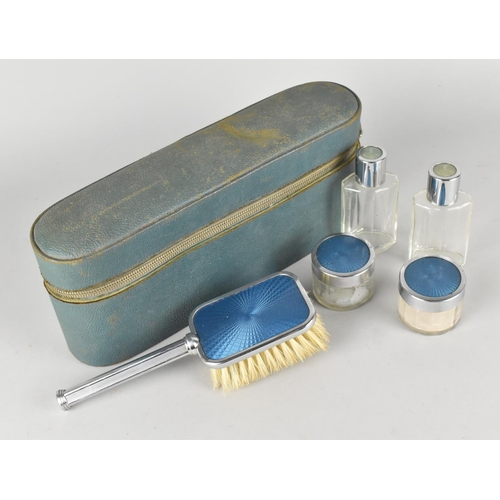 96 - A Vintage Blue Enamelled Travelling Dressing Table Set in Faux Shagreen Case, 28cms Wide