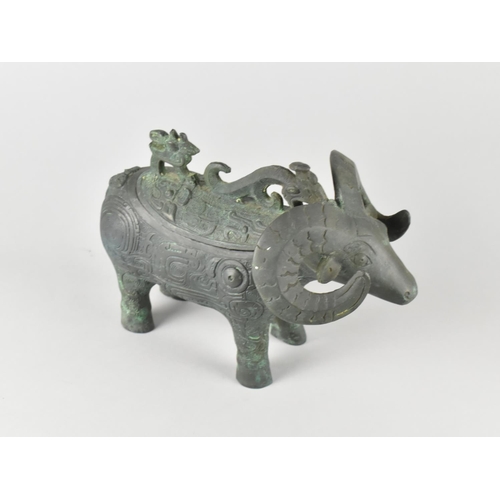 190 - A Reproduction Late Shang Dynasty Archaic Wine Vessel in the Form of a Ram, Relief Phoenix Pattern D... 