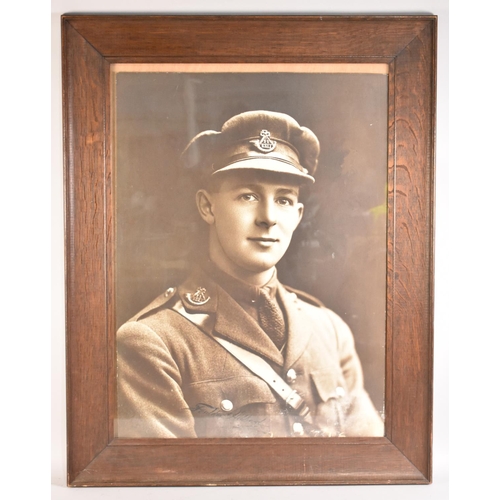 212 - A Large Oak Framed Photograph, KSLI WWI Soldier, 57x76cms