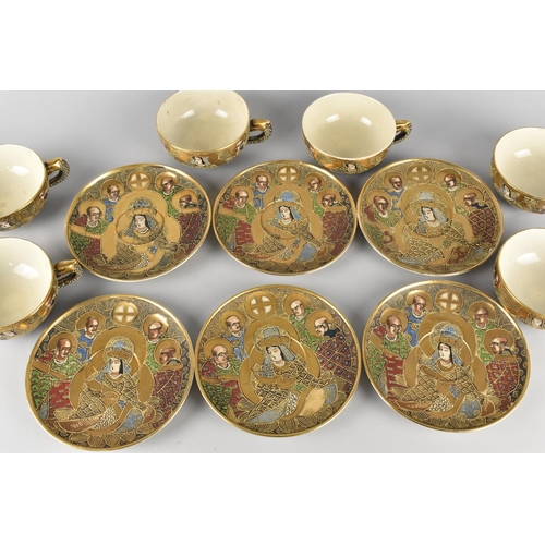 276 - A Japanese Satsuma Tea Set Comprising Six Cups and Saucers Decorated with Figures and Enriched with ... 