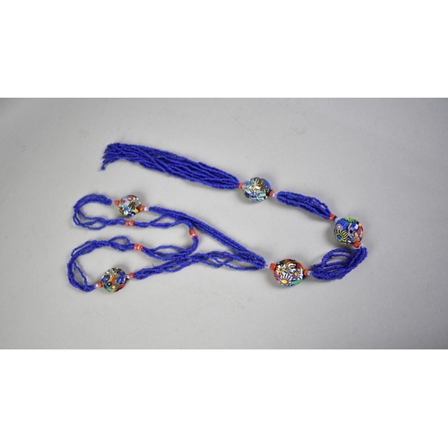 418 - A Long Vintage Millefleur and Blue Glass Necklace comprising Six Large Flattened Oval Beads, Possibl... 