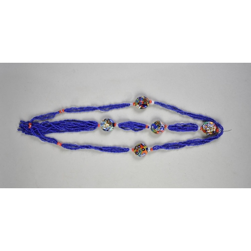 418 - A Long Vintage Millefleur and Blue Glass Necklace comprising Six Large Flattened Oval Beads, Possibl... 