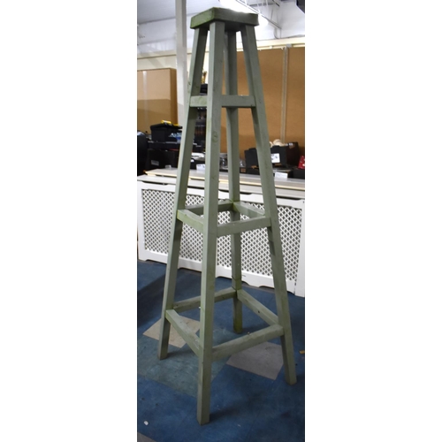 433 - A Green Painted Garden Obelisk, 178cm High