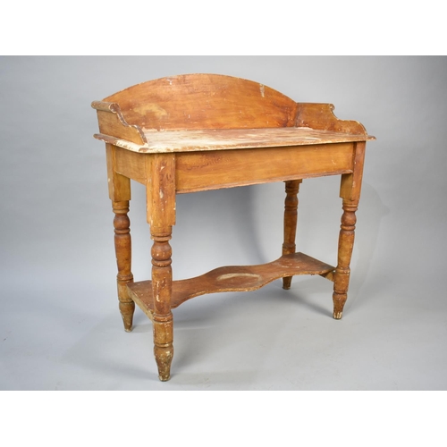 494 - A Late Victorian Stained Pine Wash Stand with Shaped Stretcher Shelf and Turned Supports, Galleried ... 