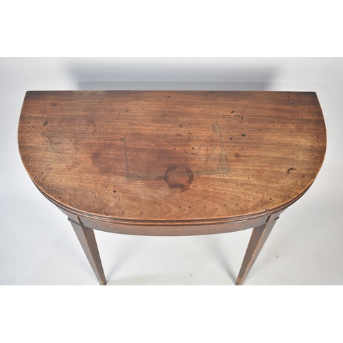 506 - A 19th Century Demilune Lift Top Tea Table on Tapering Supports, 96.5cms Wide