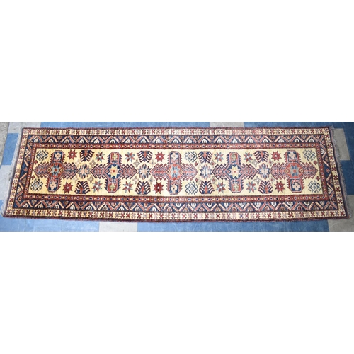 530 - A Patterned Woollen Runner, 277x80cms