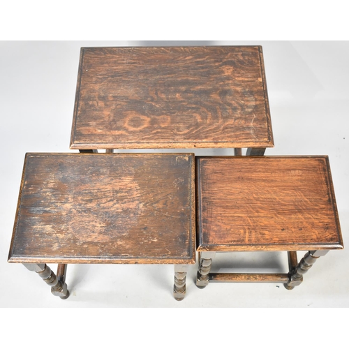 536 - A Mid 20th Century Nest of Three Oak Tables, 51cms Wide