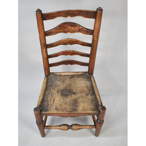 563 - An Early 19th Century Ladder Back Hall Side Chair