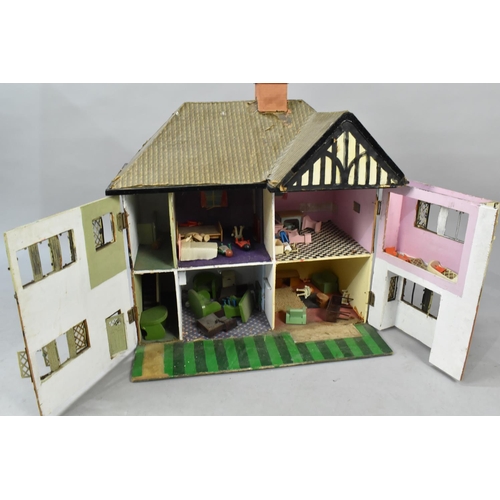 568 - A Vintage Half Timbered Dolls House with Some Furniture, Condition Issues, 66cms Wide