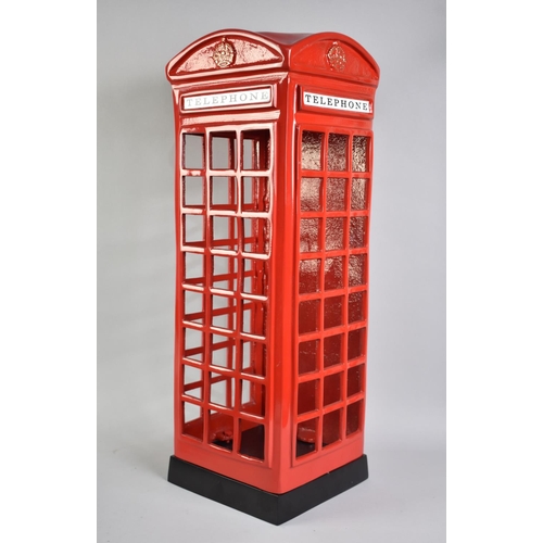 74 - A Modem Novelty Metal Red Painted Stick Stand in the Form of a Vintage Telephone Box, 58cmsn High