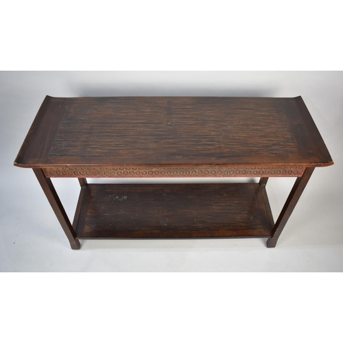 94 - A Mid/Late 20th Century Far Eastern Side Table with Stretcher Shelf, 122cms Wide, Carved Top Rail