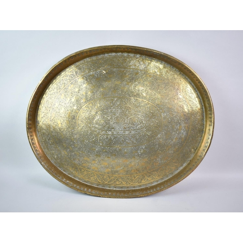 105 - A Nice Quality Oval Indian Brass Benaries Tray with Engraved Decoration, 63x50cms