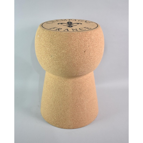 114 - A Novelty Stool in the Form of a Champagne Cork, 35cms Diameter and 50cms High