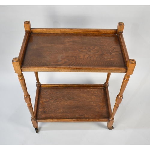 151 - A Mid 20th Century Rectangular Two Tier Oak Trolley, 64x38cms