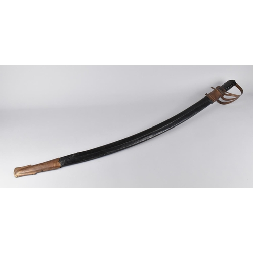 155 - An Indian Curved Blade Sikh Sword with Engraved Blade