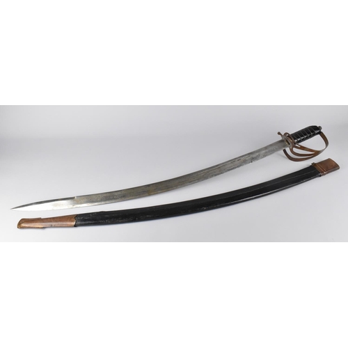 155 - An Indian Curved Blade Sikh Sword with Engraved Blade